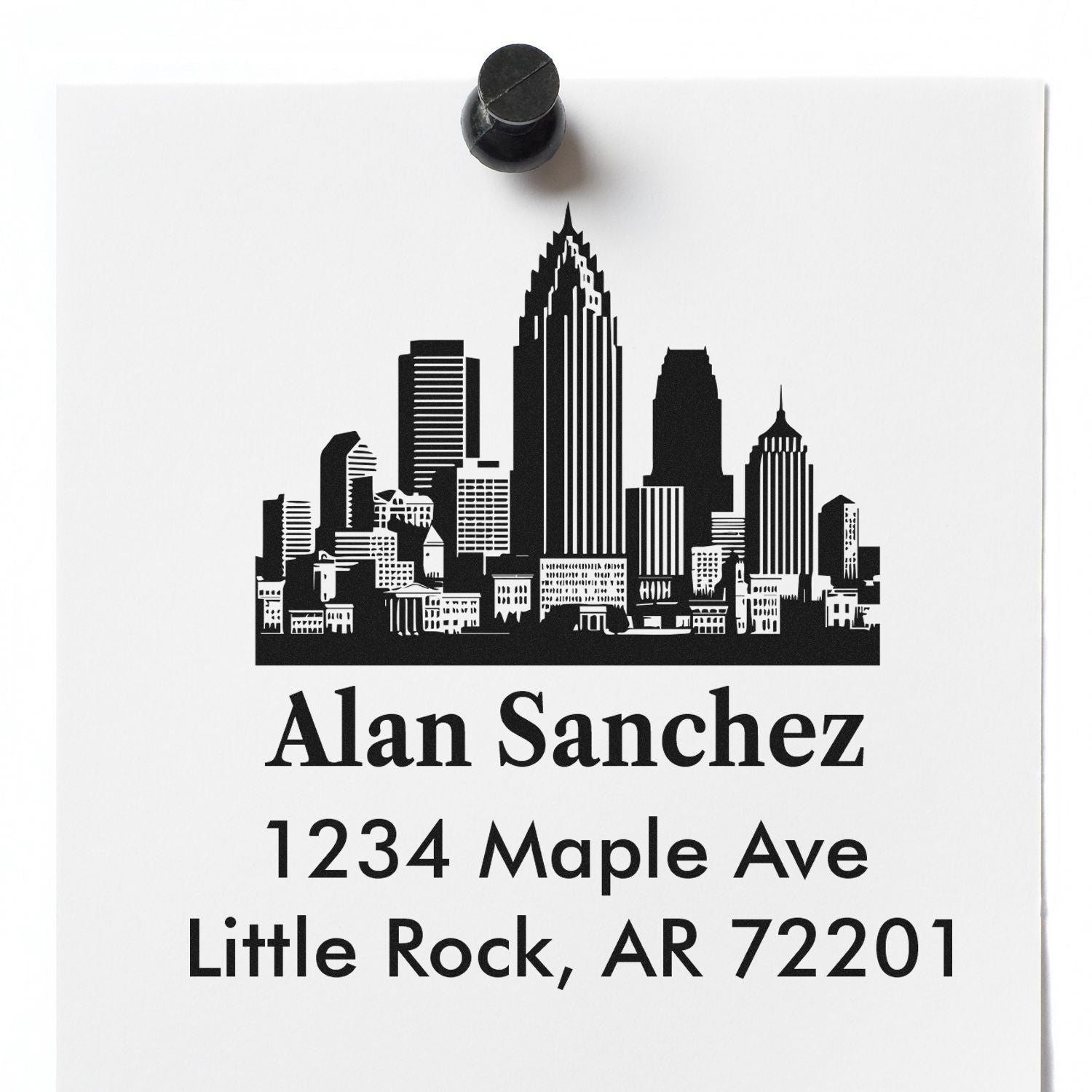 Custom rubber address stamp with city skyline, name, and Little Rock, AR return address design