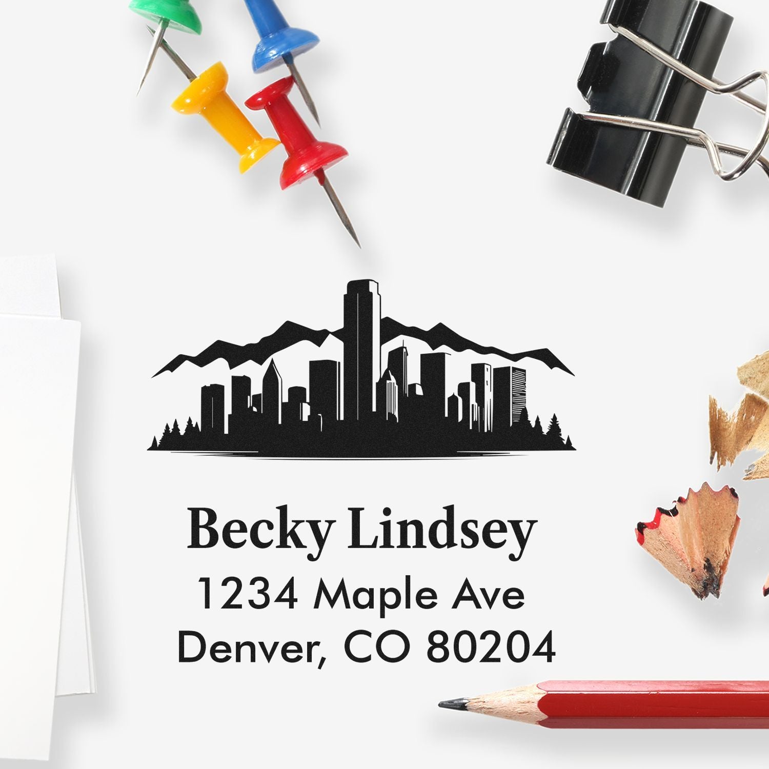 Custom self-inking address rubber stamp with Denver skyline and return address for Becky Lindsey