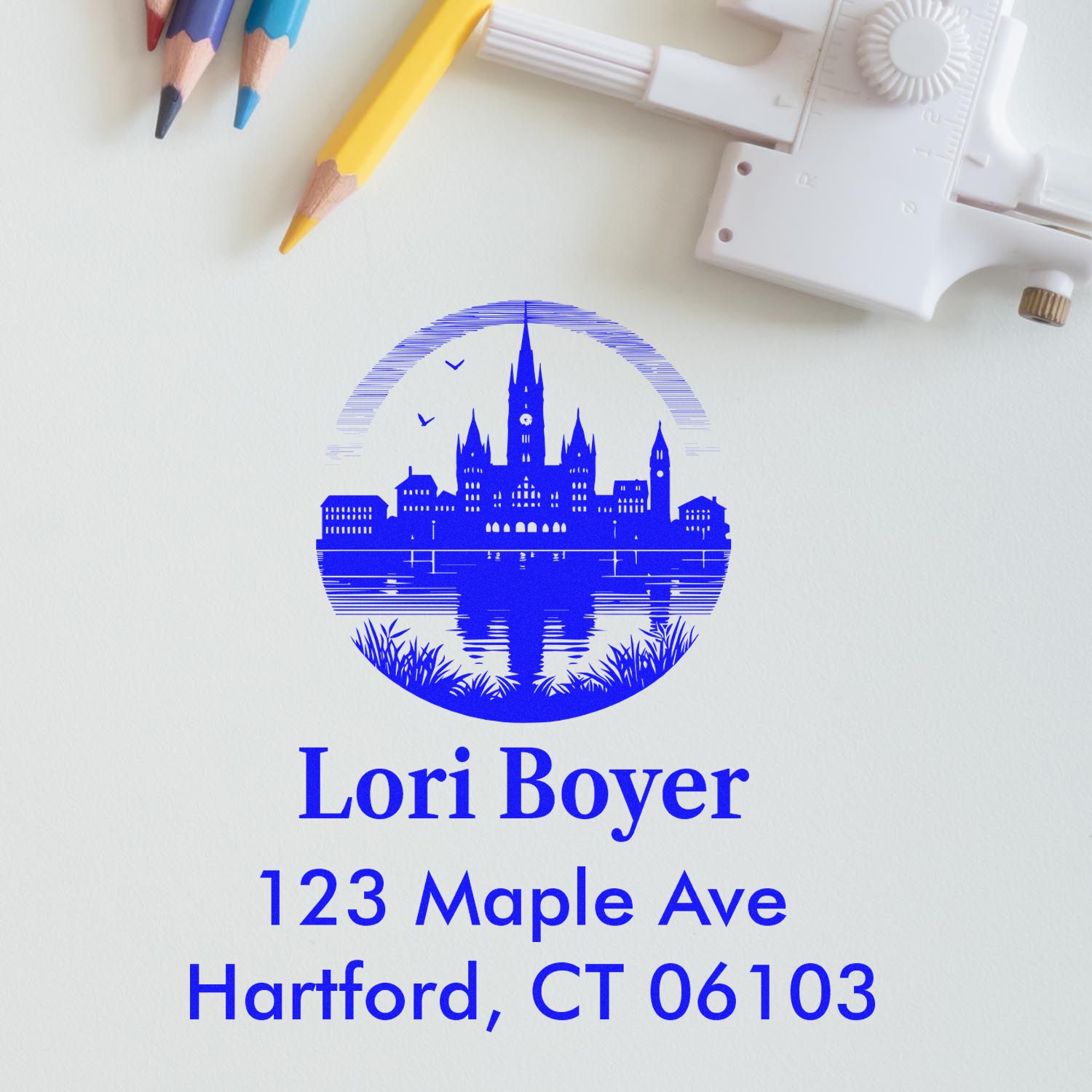 Custom return address rubber stamp with skyline logo and Hartford, CT address for personalized mailing.