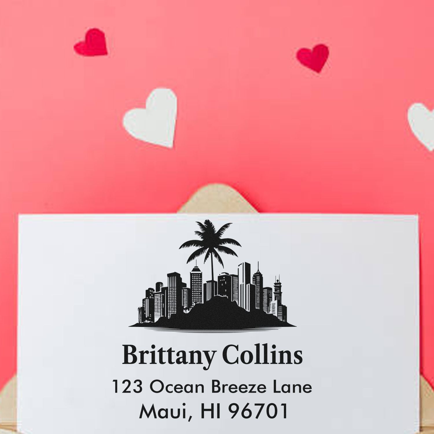Custom return address rubber stamp with skyline and palm tree design for Brittany Collins, Maui, HI envelope