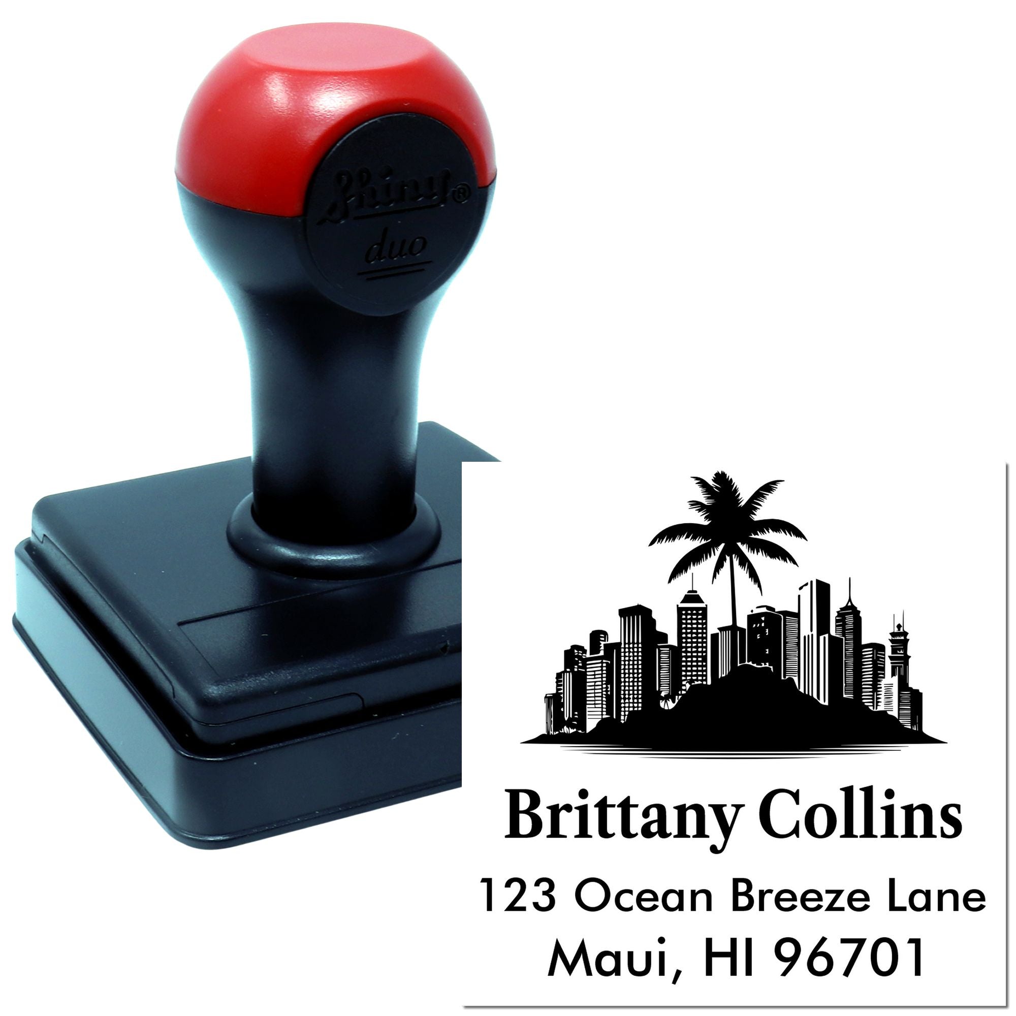 Custom self-inking address rubber stamp with tropical skyline design and Brittany Collins return address, Maui, HI 96701.