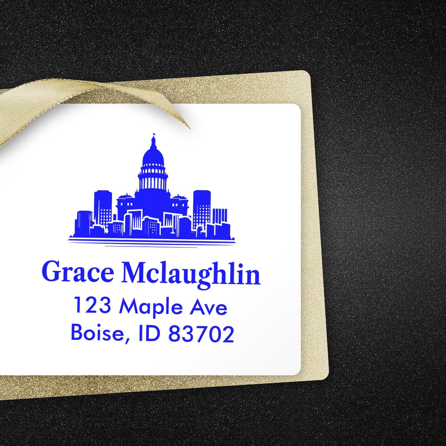 Custom return address rubber stamp with skyline design for Grace McLaughlin, Boise, ID 83702