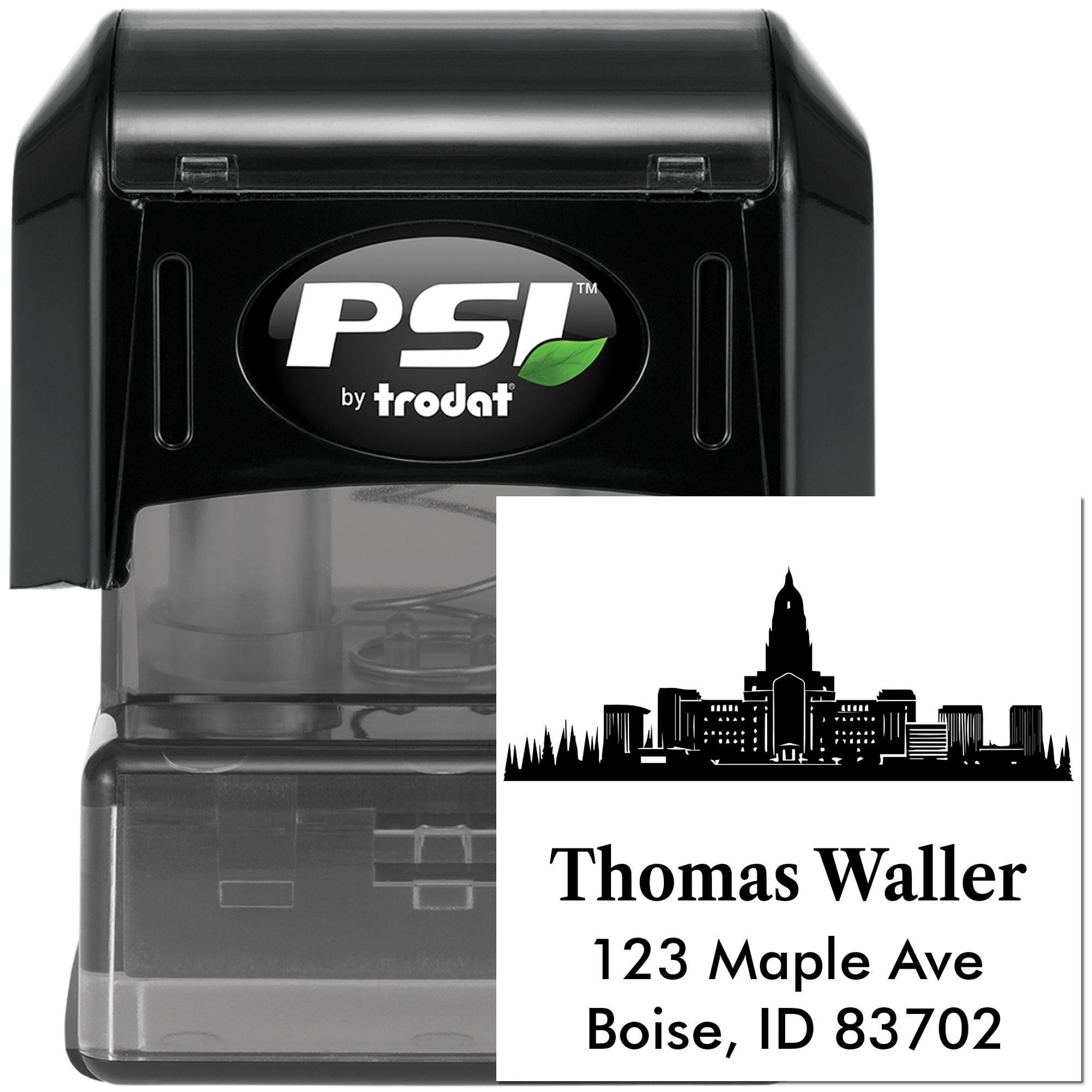 Custom self-inking rubber address stamp with skyline, Thomas Waller, 123 Maple Ave, Boise, ID 83702.