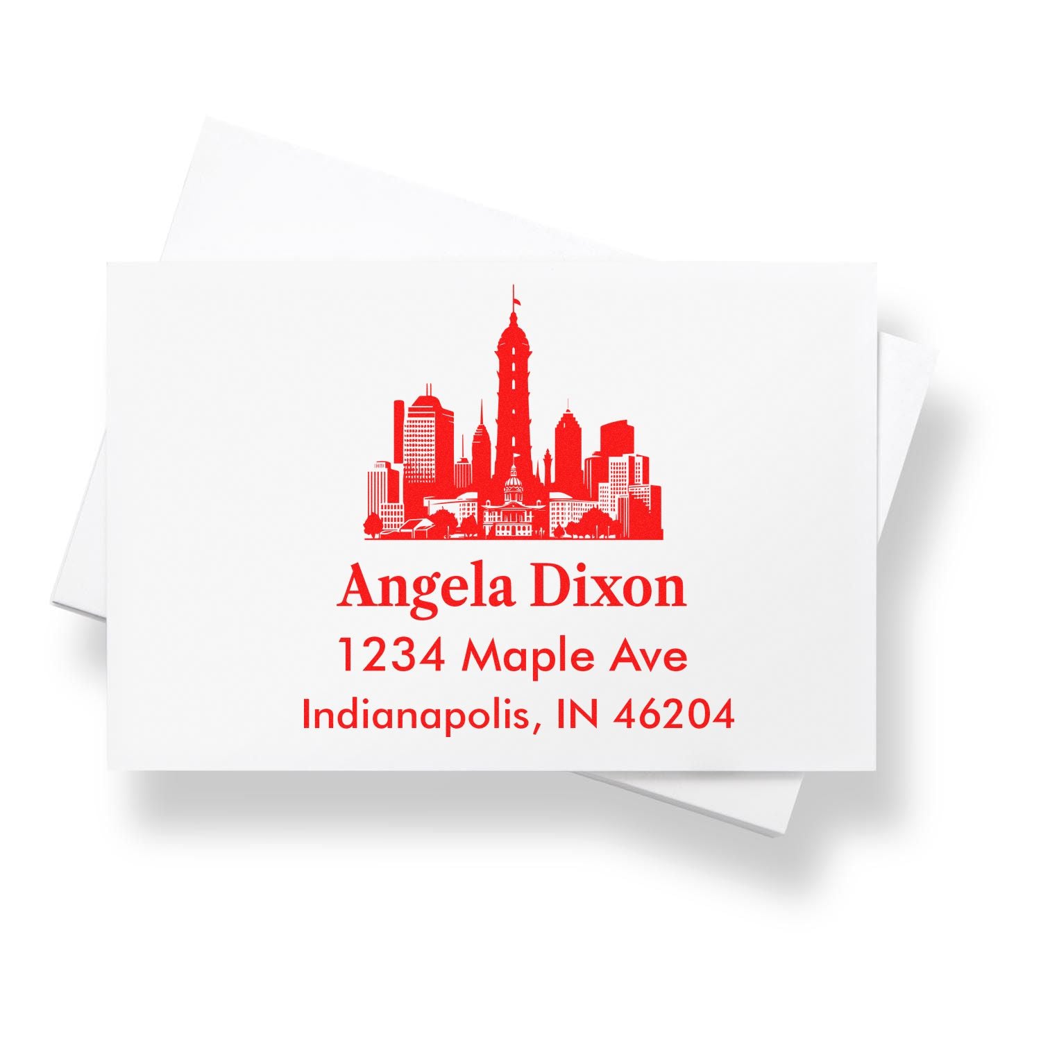 Custom return address rubber stamp with Indianapolis skyline, Angela Dixon, 1234 Maple Ave, Indianapolis, IN 46204.
