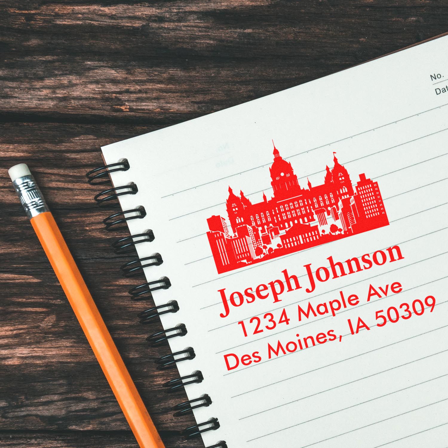 Custom address rubber stamp with skyline design showing Joseph Johnsons Des Moines return address for personalized mailing.