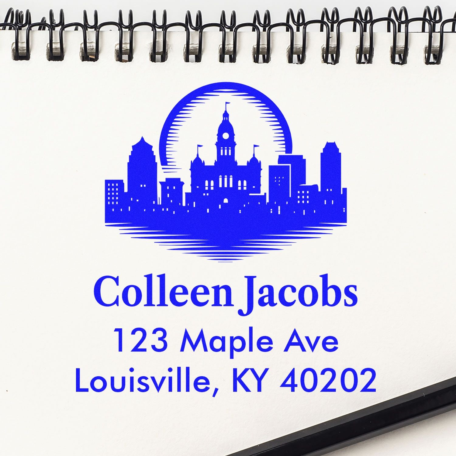 Custom Louisville skyline return address rubber stamp for Colleen Jacobs, 123 Maple Ave, Louisville, KY 40202