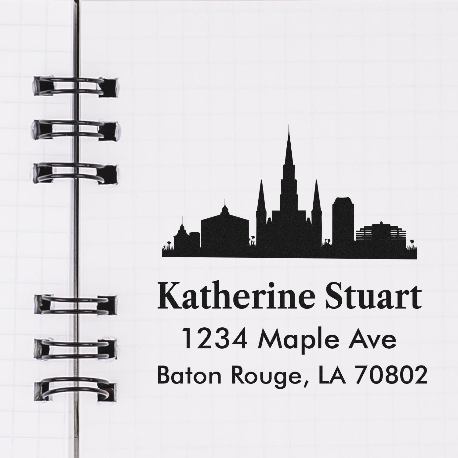Custom return address rubber stamp with Baton Rouge skyline, Katherine Stuart, 1234 Maple Ave, Baton Rouge, LA 70802.