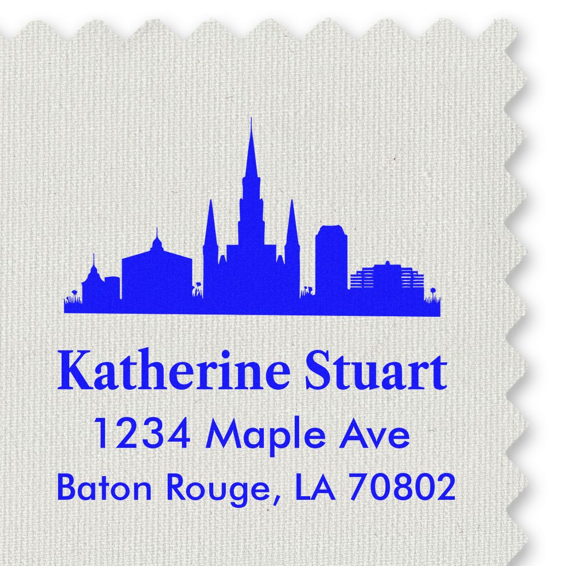 Custom return address rubber stamp with Baton Rouge skyline, Katherine Stuart, 1234 Maple Ave, Baton Rouge, LA 70802.