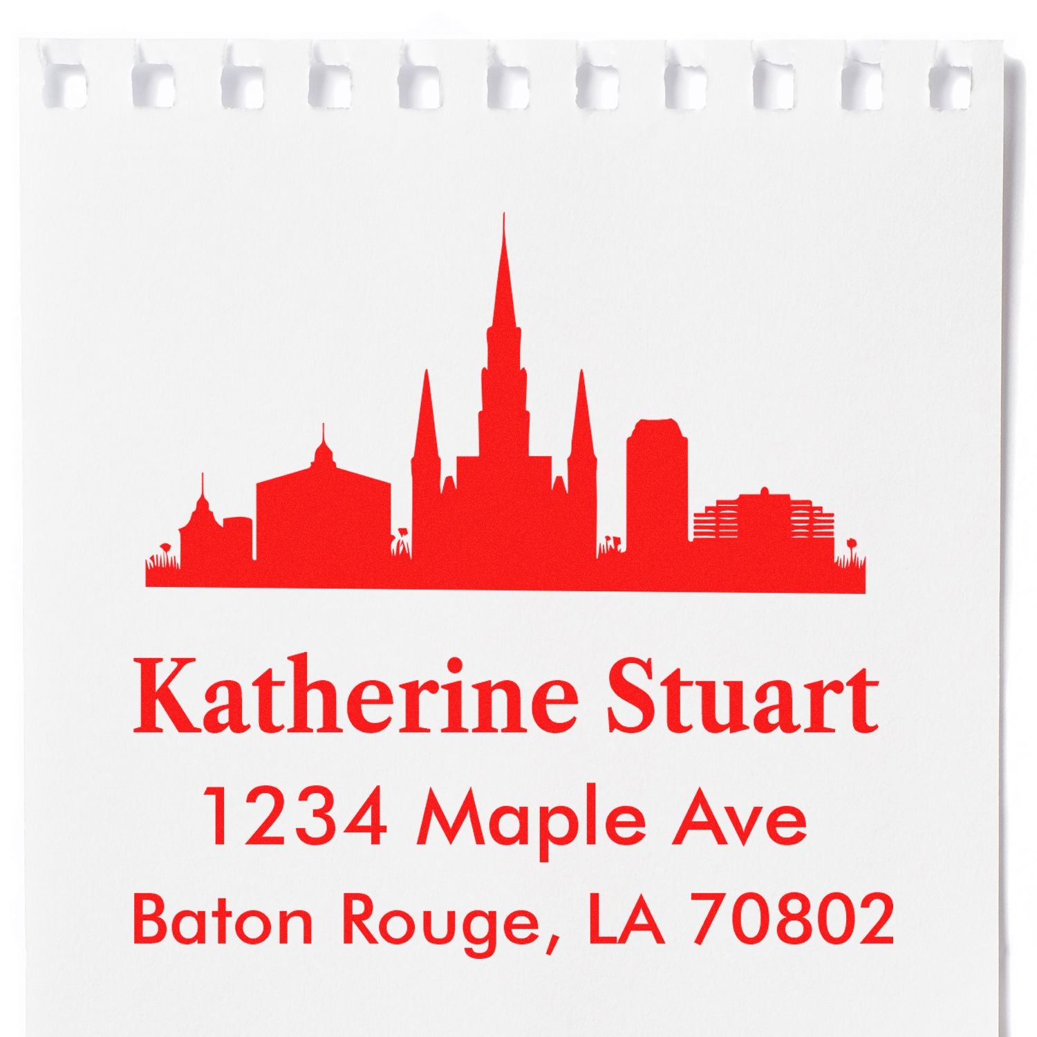 Custom Baton Rouge, LA address rubber stamp with skyline design, name, street address, and ZIP code in red.