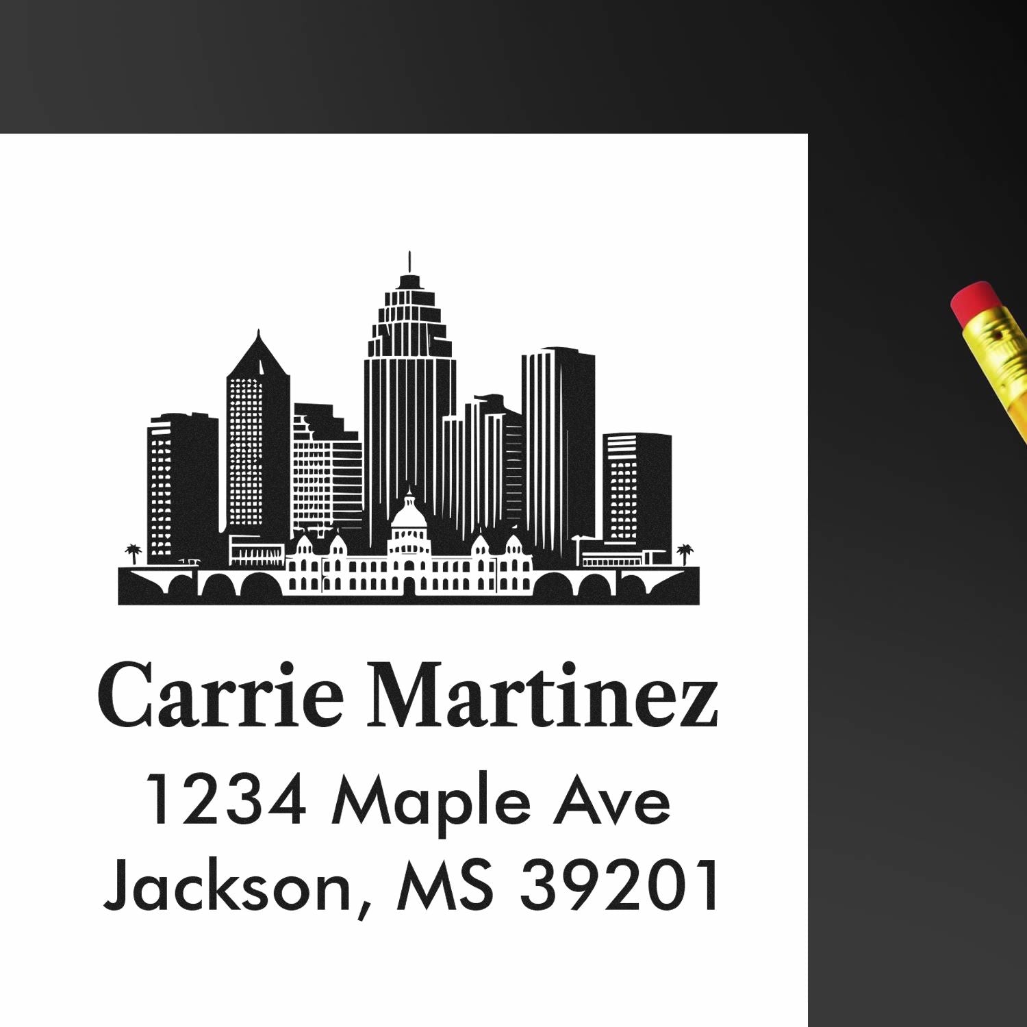 Custom rubber address stamp with city skyline, Carrie Martinez, 1234 Maple Ave, Jackson, MS 39201
