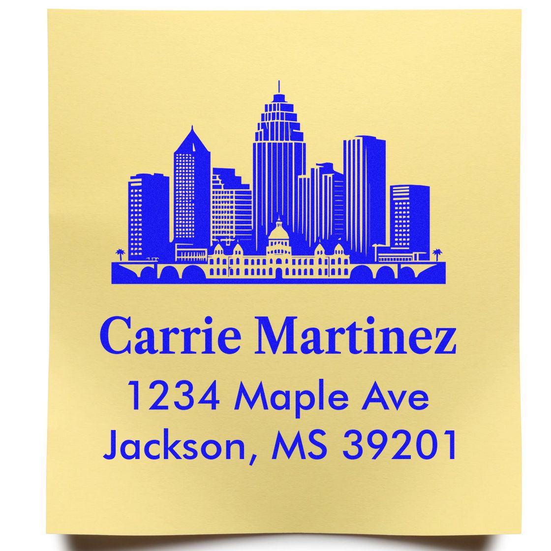 Personalized return address rubber stamp with Jackson, MS skyline, Carrie Martinez, 1234 Maple Ave, Jackson, MS 39201.