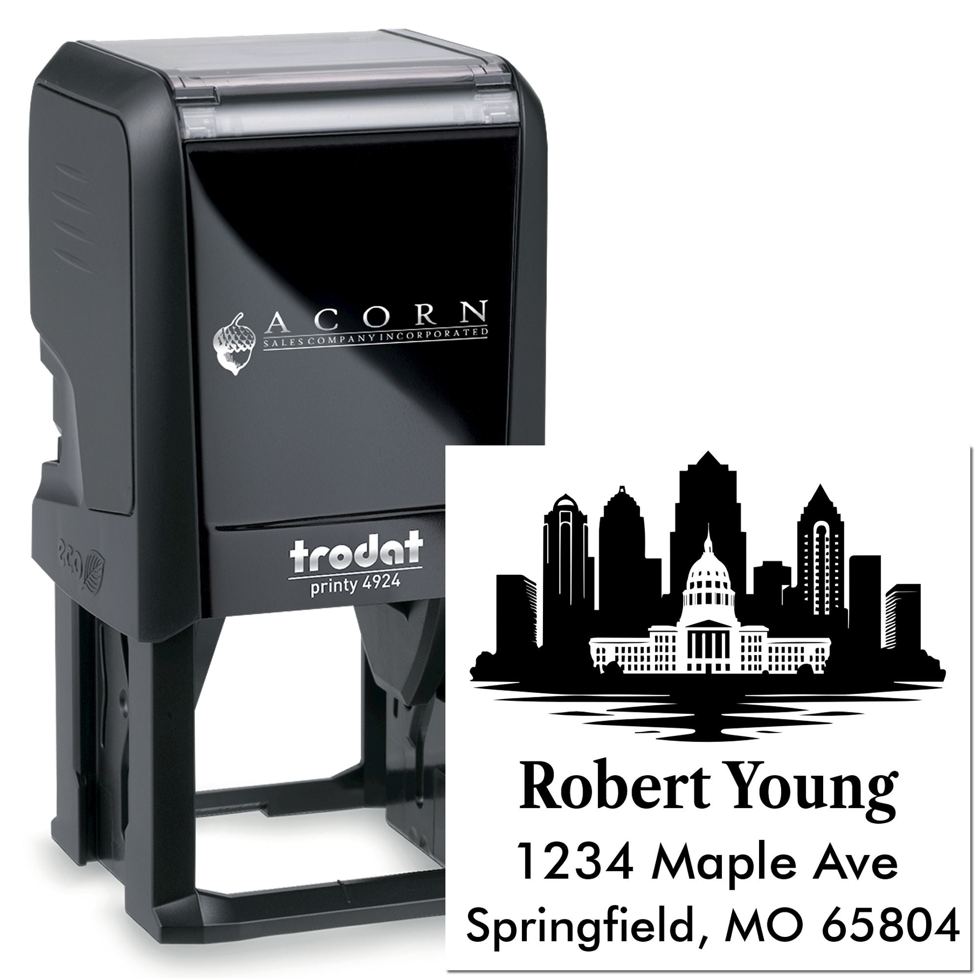 Trodat self-inking rubber stamp with custom city skyline address design for business branding and mailing labels.