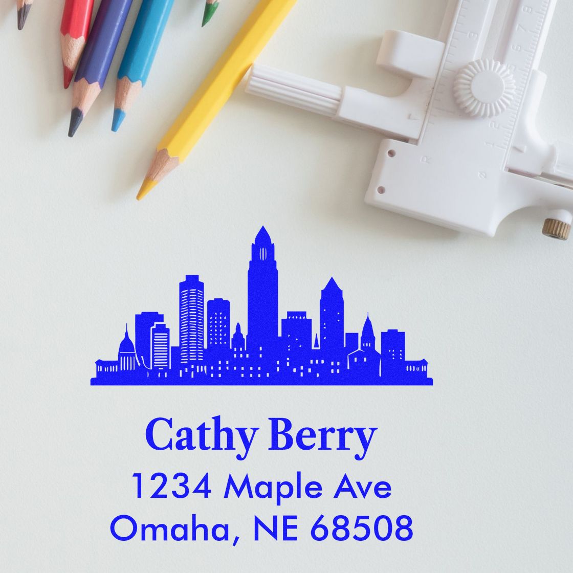 Custom skyline address rubber stamp for Cathy Berry, 1234 Maple Ave, Omaha, NE 68508