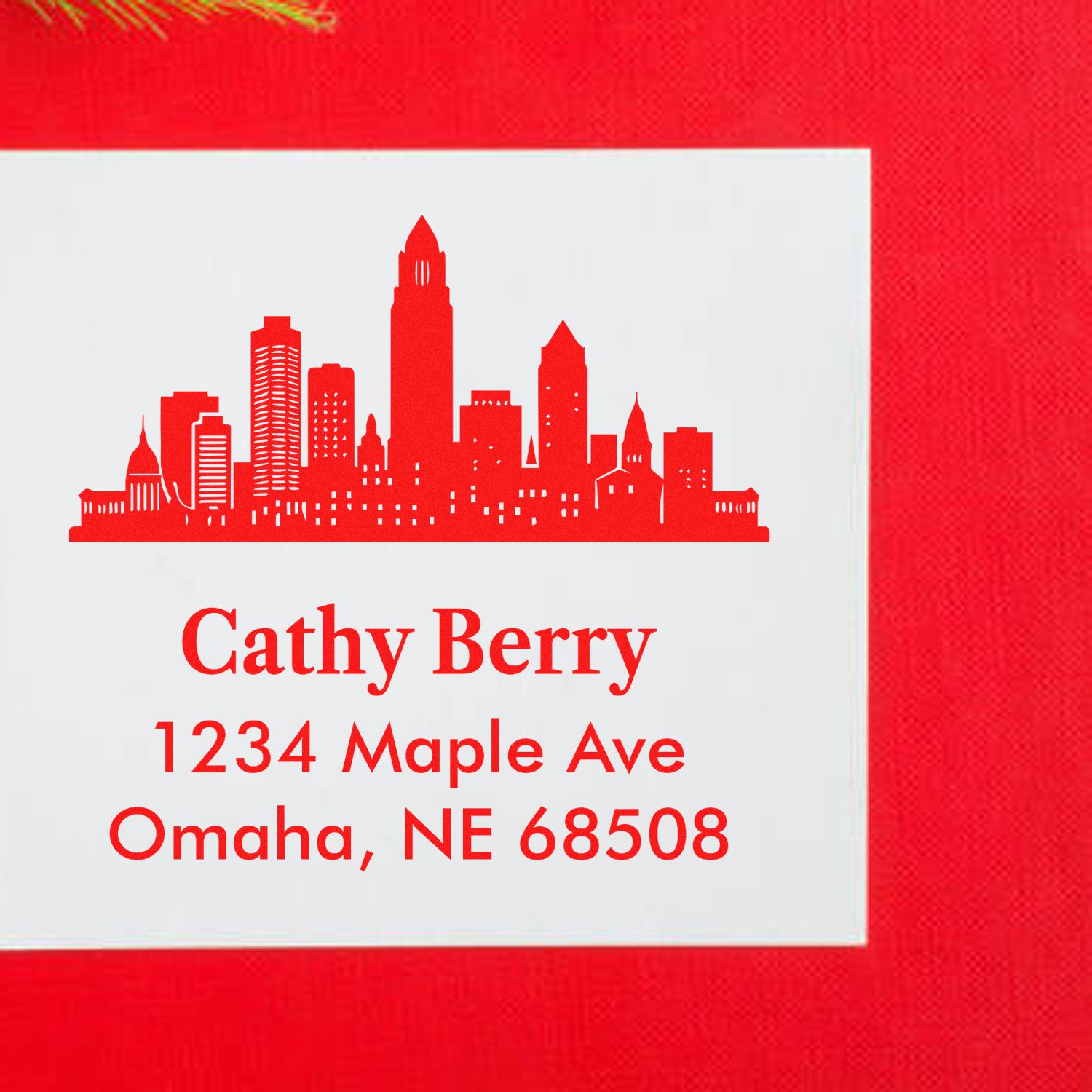 Personalized return address rubber stamp with city skyline, Cathy Berry, 1234 Maple Ave, Omaha, NE 68508