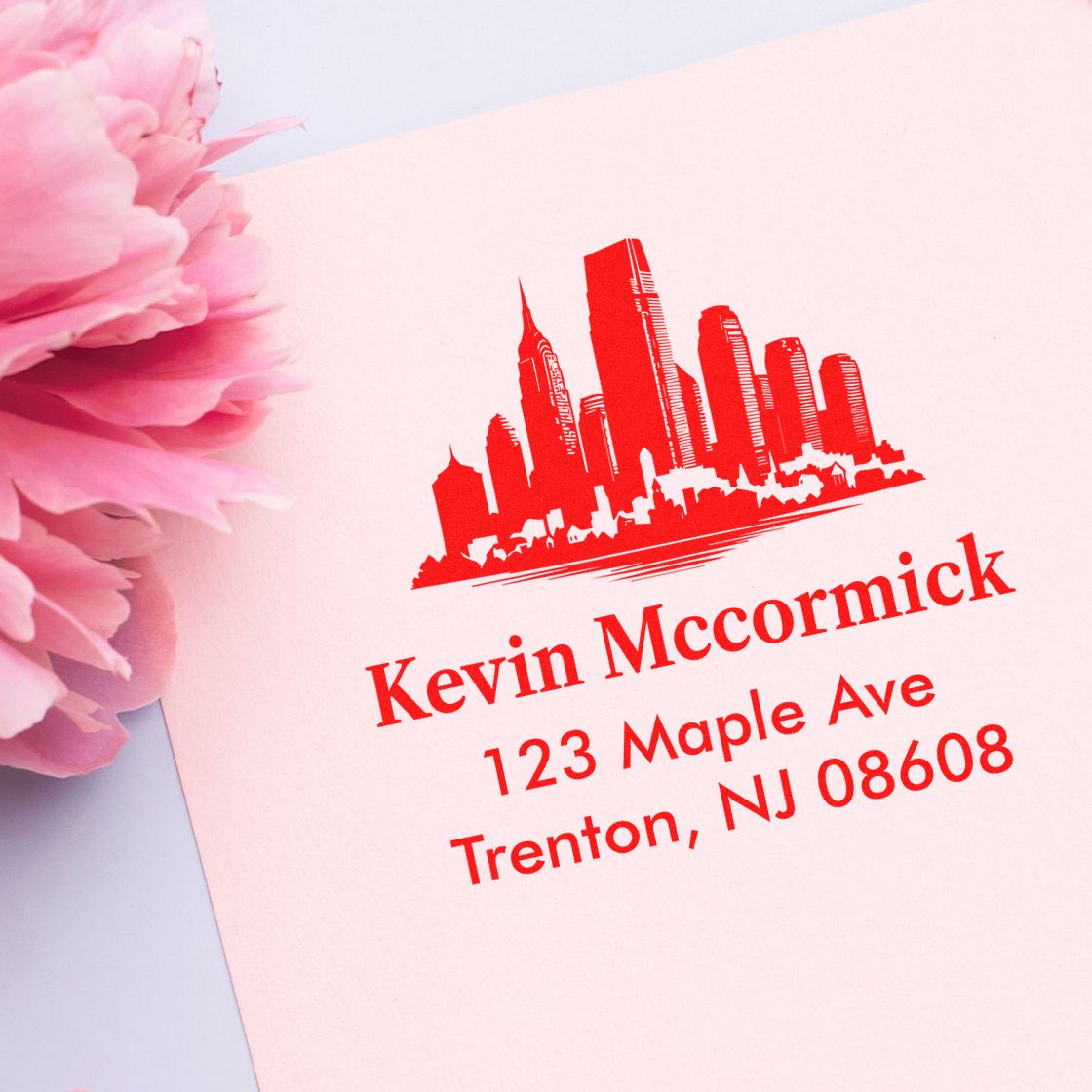 Personalized rubber address stamp with skyline logo and Kevin Mccormick return address for Trenton, NJ stationery.