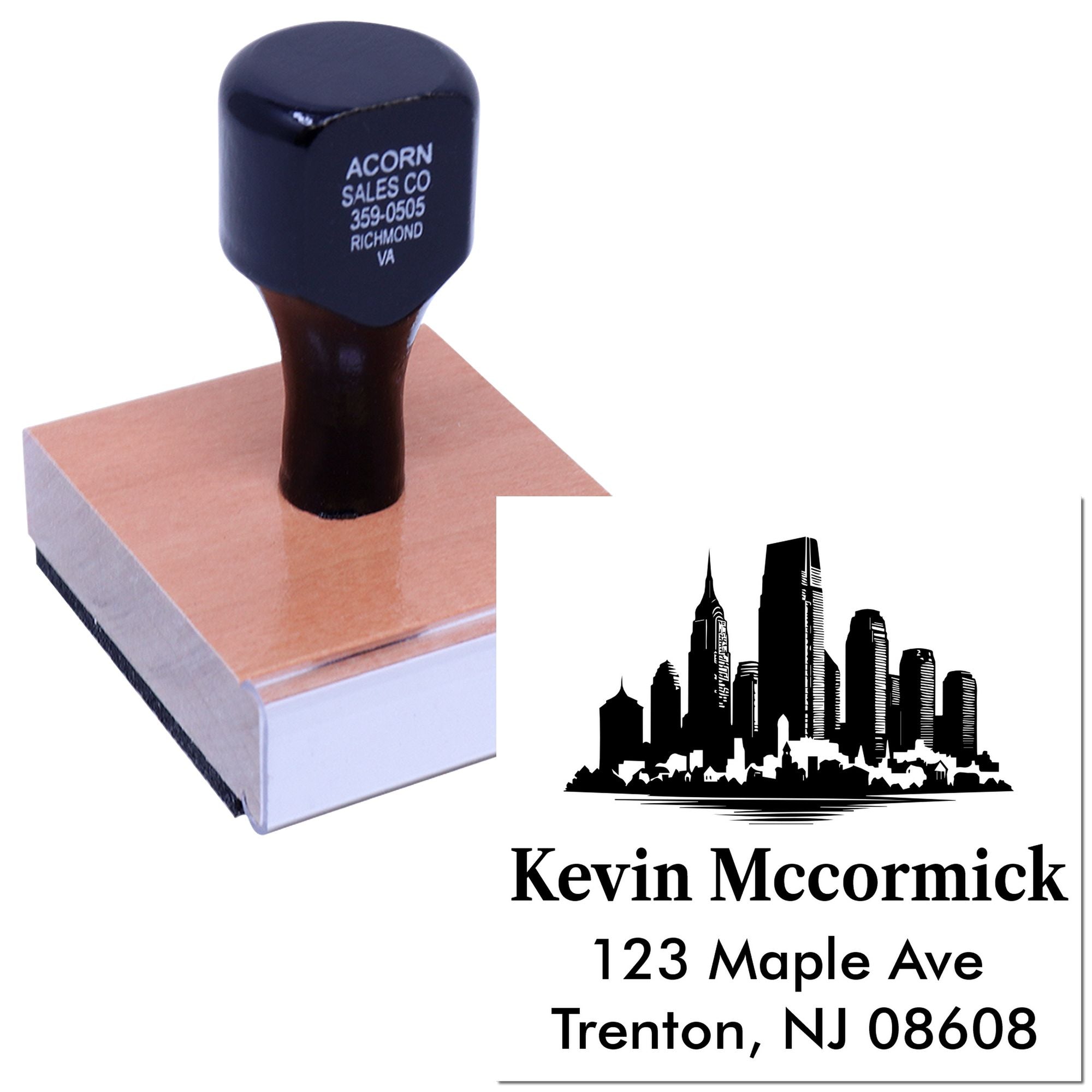 Custom rubber address stamp with skyline logo, personalized name, and mailing address for business mail.