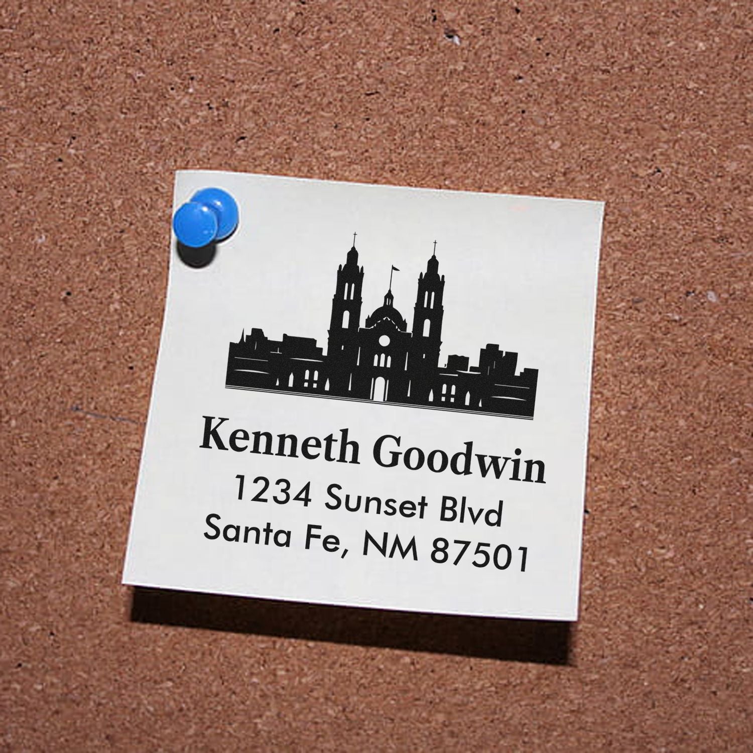 Custom return address rubber stamp with city skyline for Kenneth Goodwin, Santa Fe, NM.