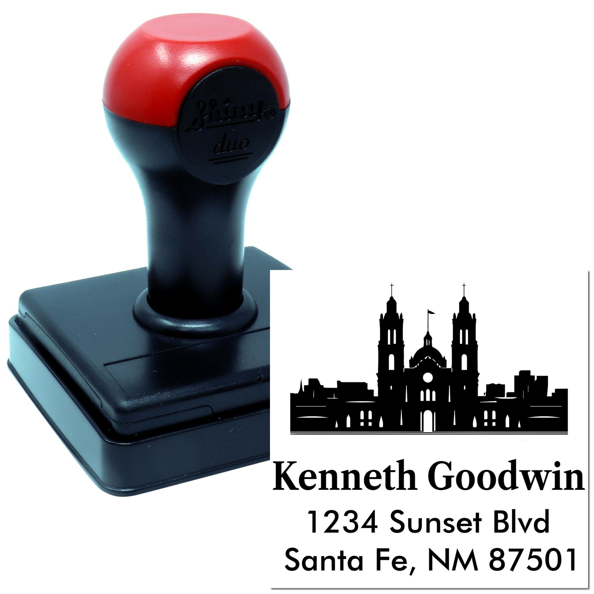 Custom self-inking rubber address stamp with skyline design and Kenneth Goodwin return address imprint.
