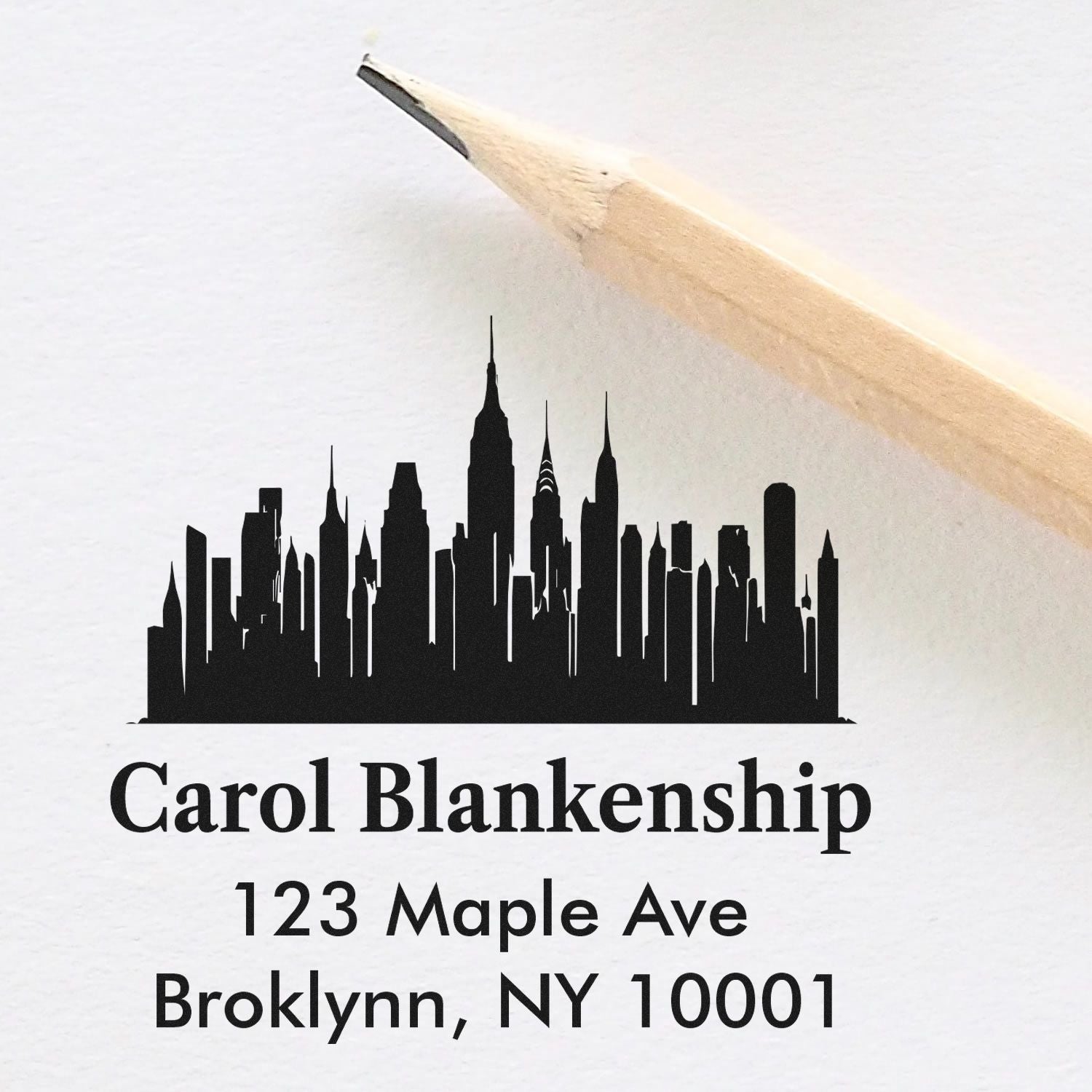 Custom rubber address stamp with city skyline design for Carol Blankenship, Brooklyn, NY 10001.