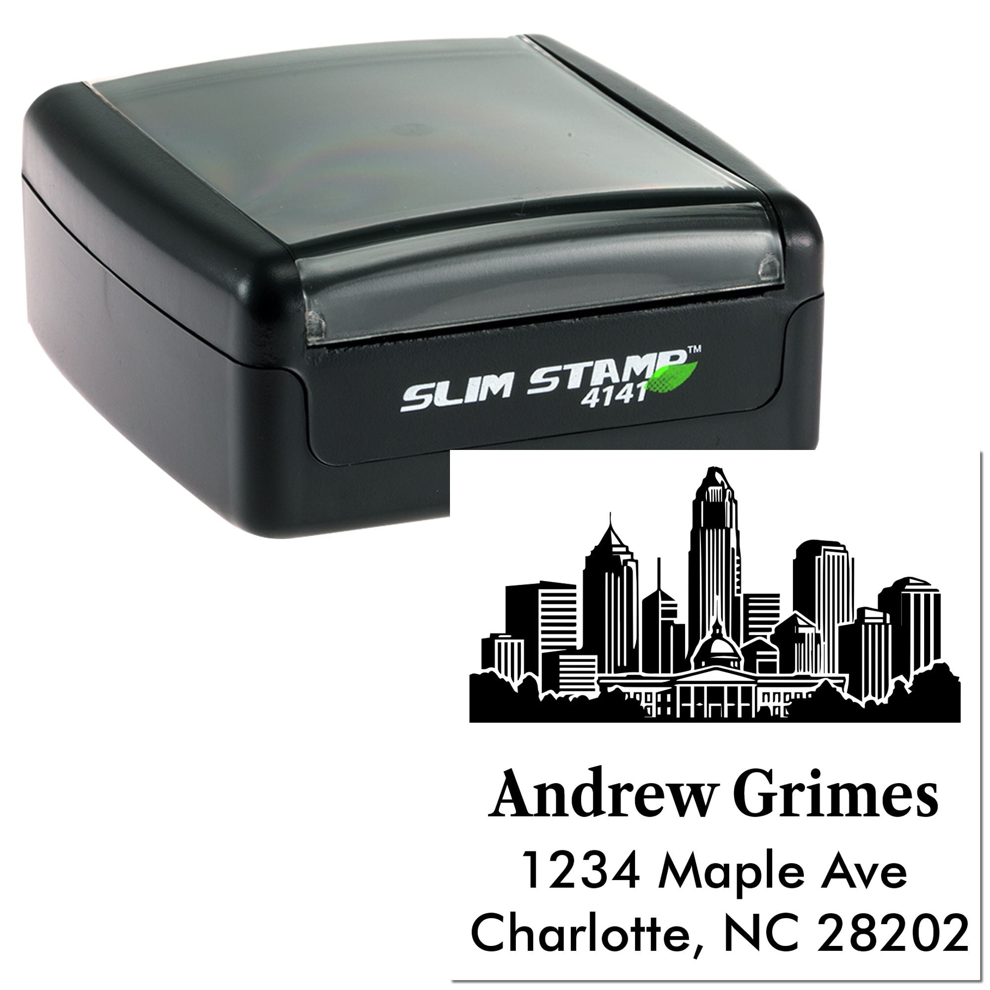 Custom self-inking rubber return address stamp with Charlotte NC skyline and Andrew Grimes address.