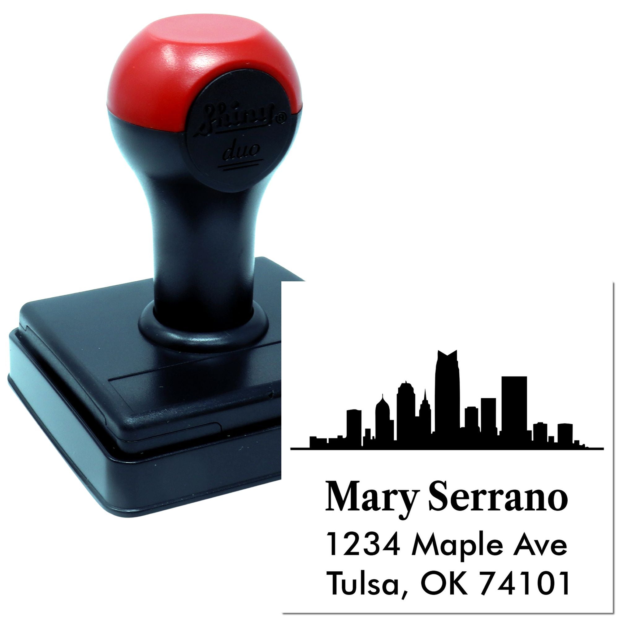 Custom rubber stamp with city skyline and personalized return address for Mary Serrano, Tulsa, OK 74101.