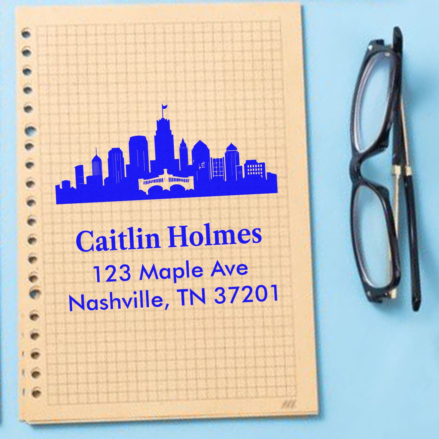 Custom Nashville address rubber stamp with skyline design, personalized name, and return address for mailing.