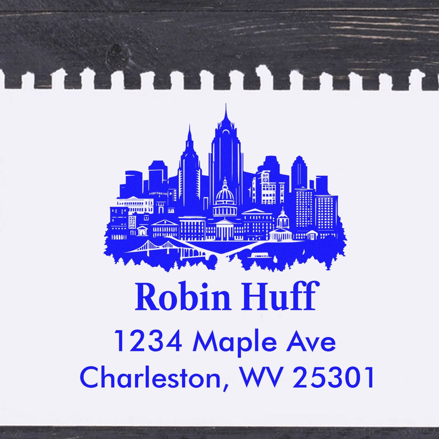 Personalized return address rubber stamp with Charleston skyline for Robin Huff, 1234 Maple Ave, Charleston, WV 25301.