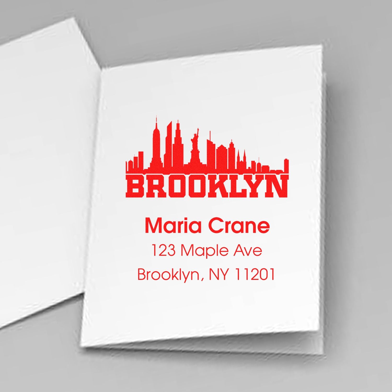 Custom Brooklyn address rubber stamp with skyline logo, Maria Crane, 123 Maple Ave, Brooklyn, NY 11201.