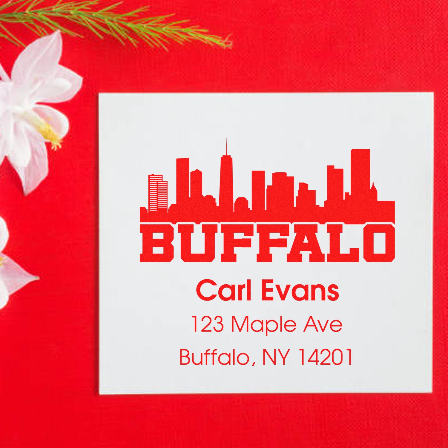 Custom Buffalo return address rubber stamp with skyline, Carl Evans, 123 Maple Ave, Buffalo, NY 14201.