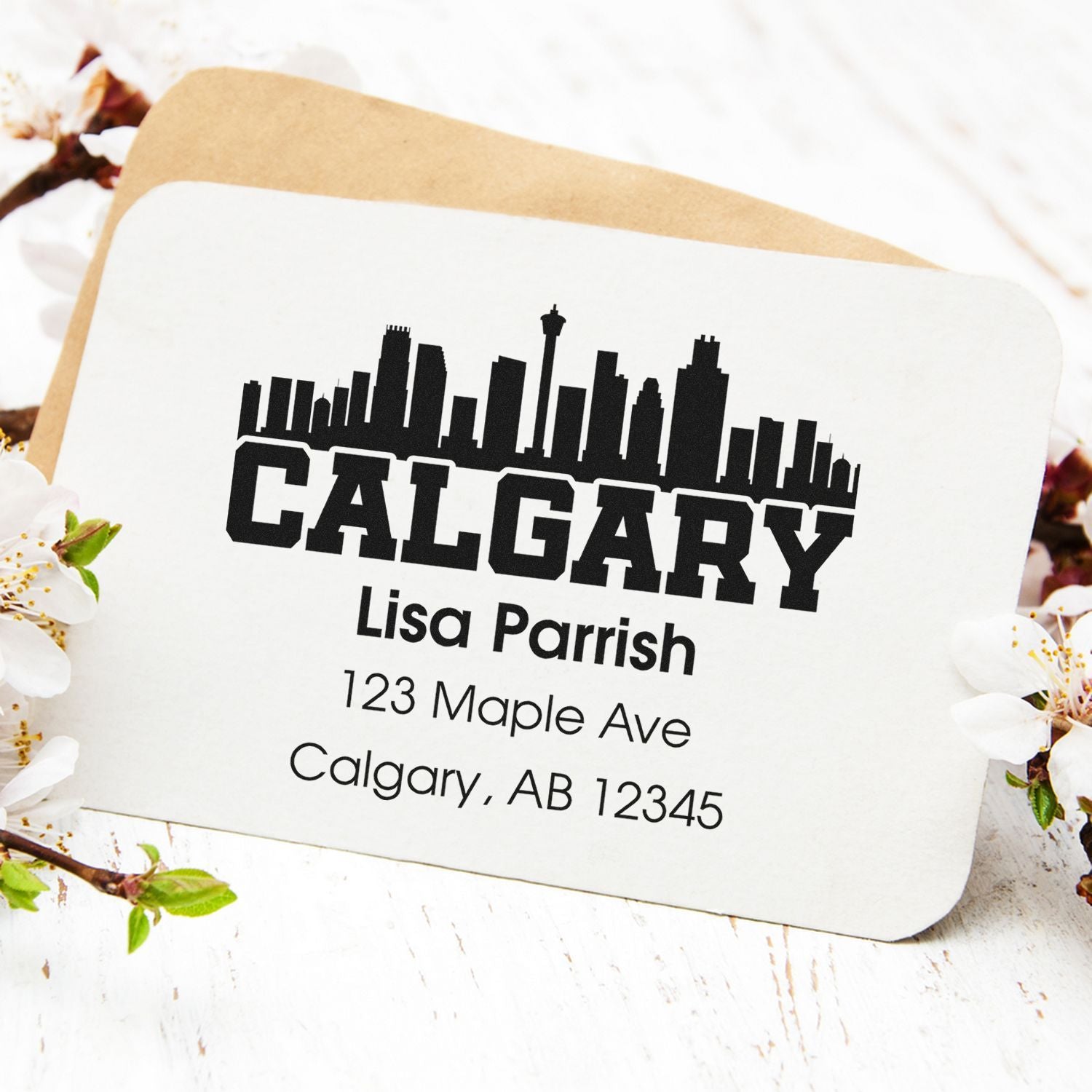 Custom Calgary return address rubber stamp with skyline design for envelopes and mailing labels.
