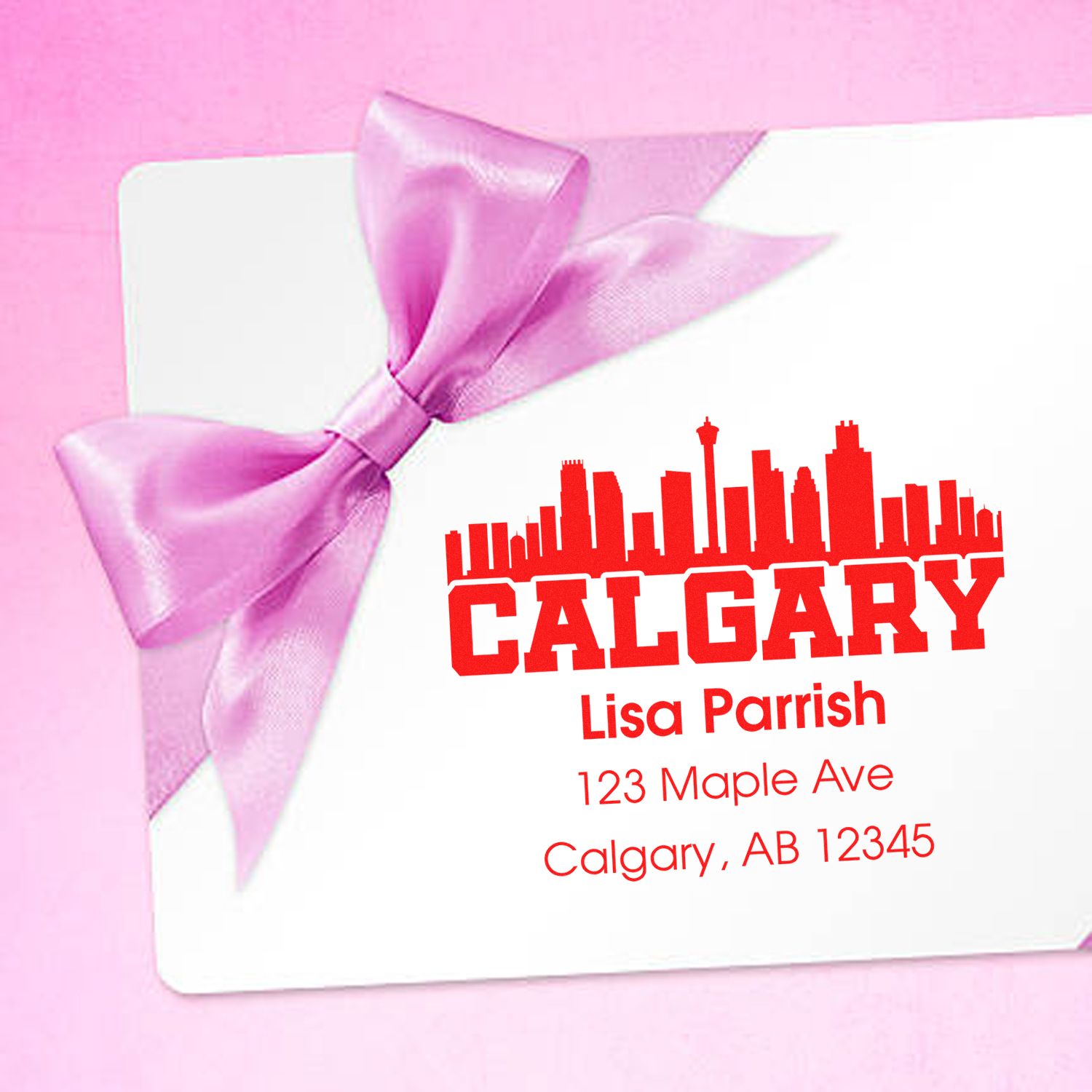 Custom Calgary address rubber stamp with name and return address for personalized mailing.