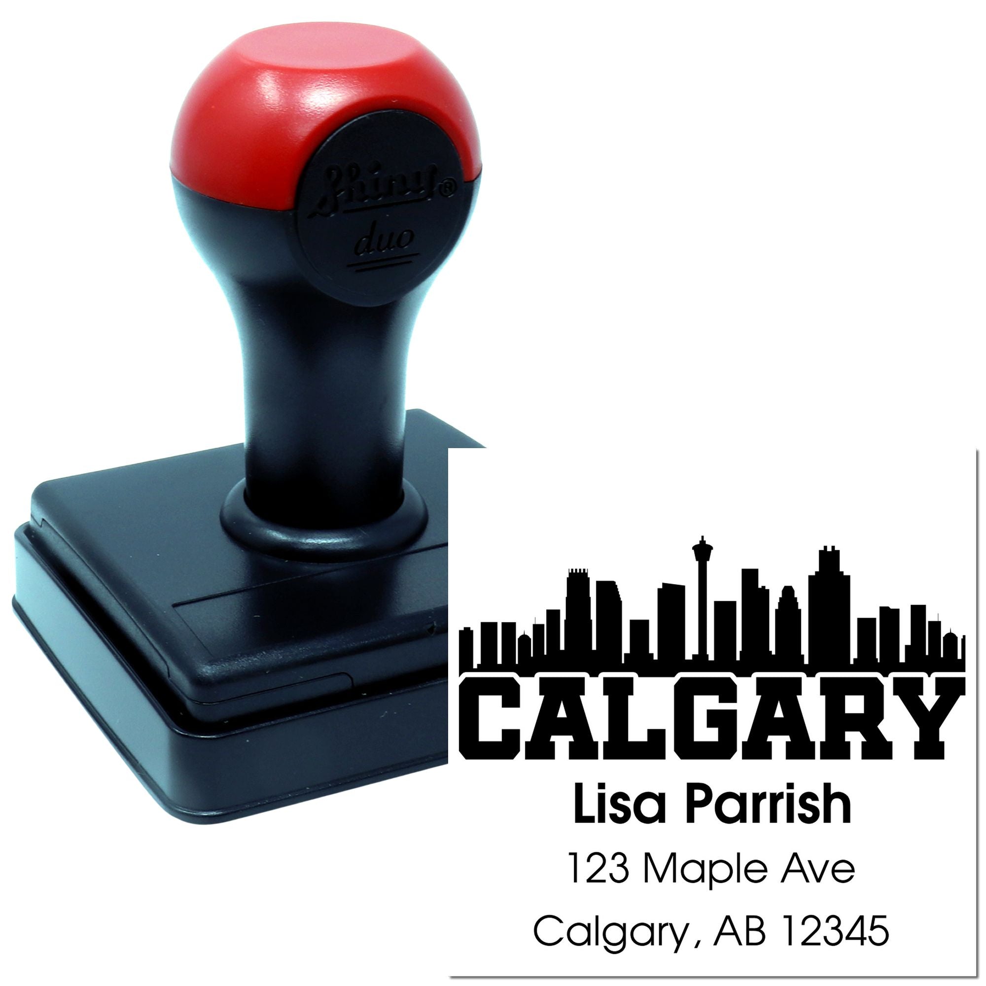Custom self-inking rubber stamp with Calgary skyline and personalized return address imprint.