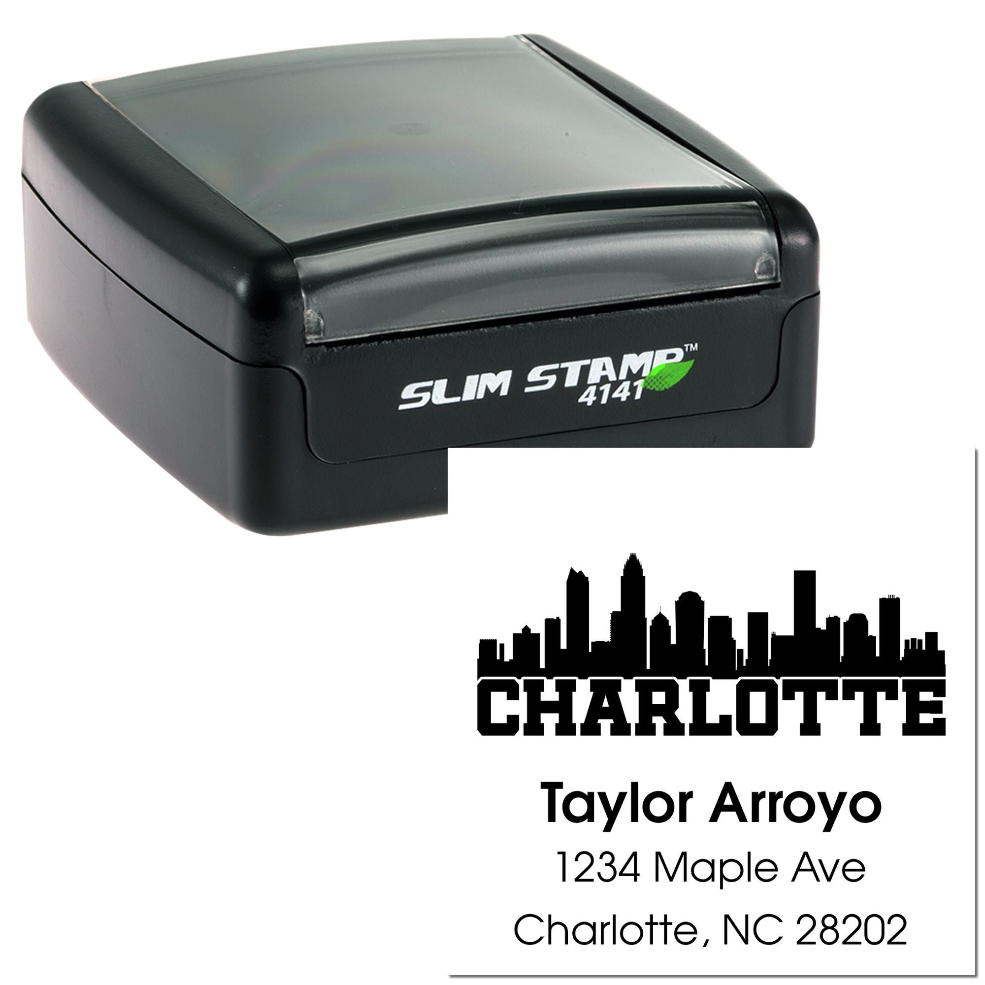 Custom self-inking rubber address stamp with Charlotte skyline and Taylor Arroyo return address for personalized mailing.