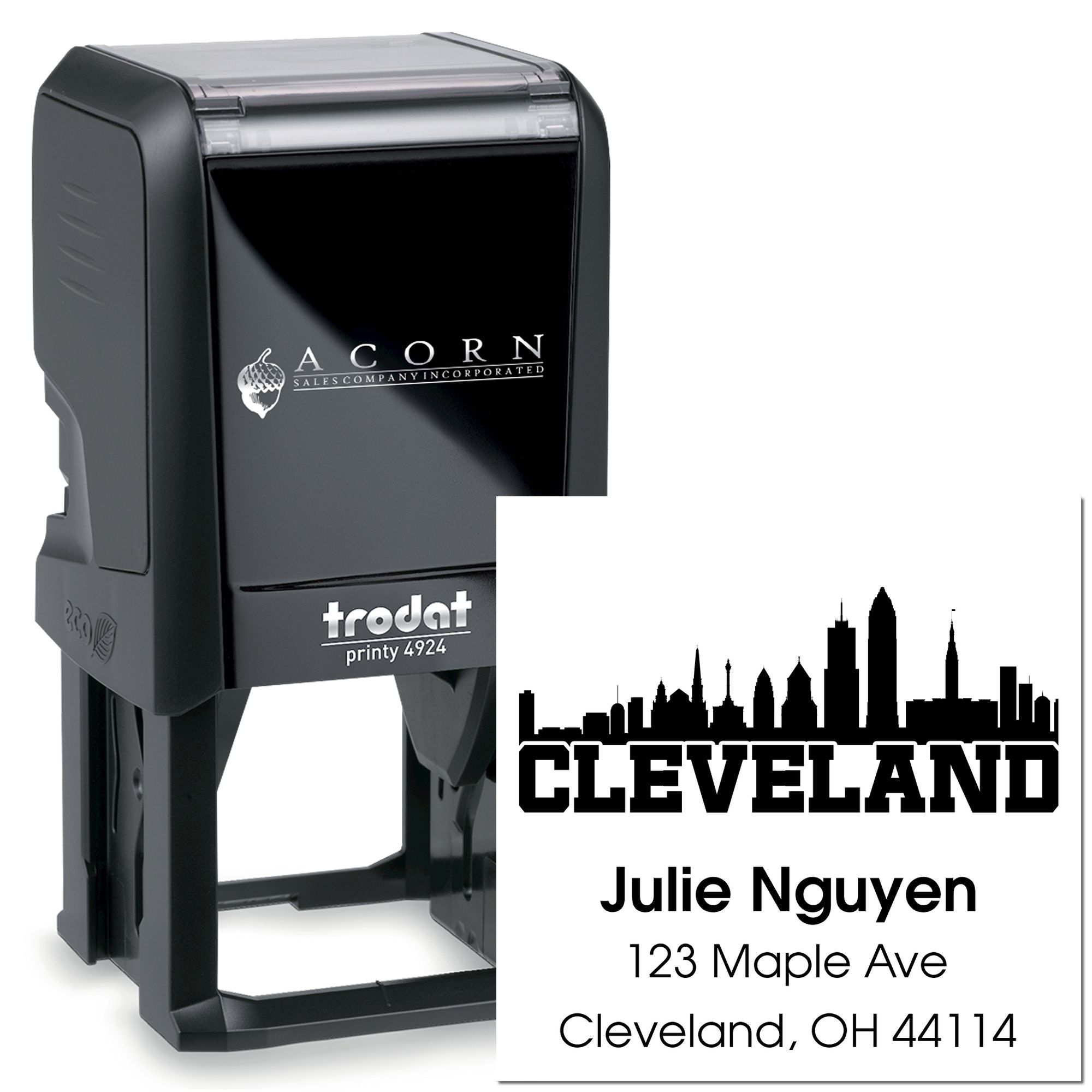 Custom self-inking rubber address stamp with Cleveland skyline, Julie Nguyen, and 123 Maple Ave.