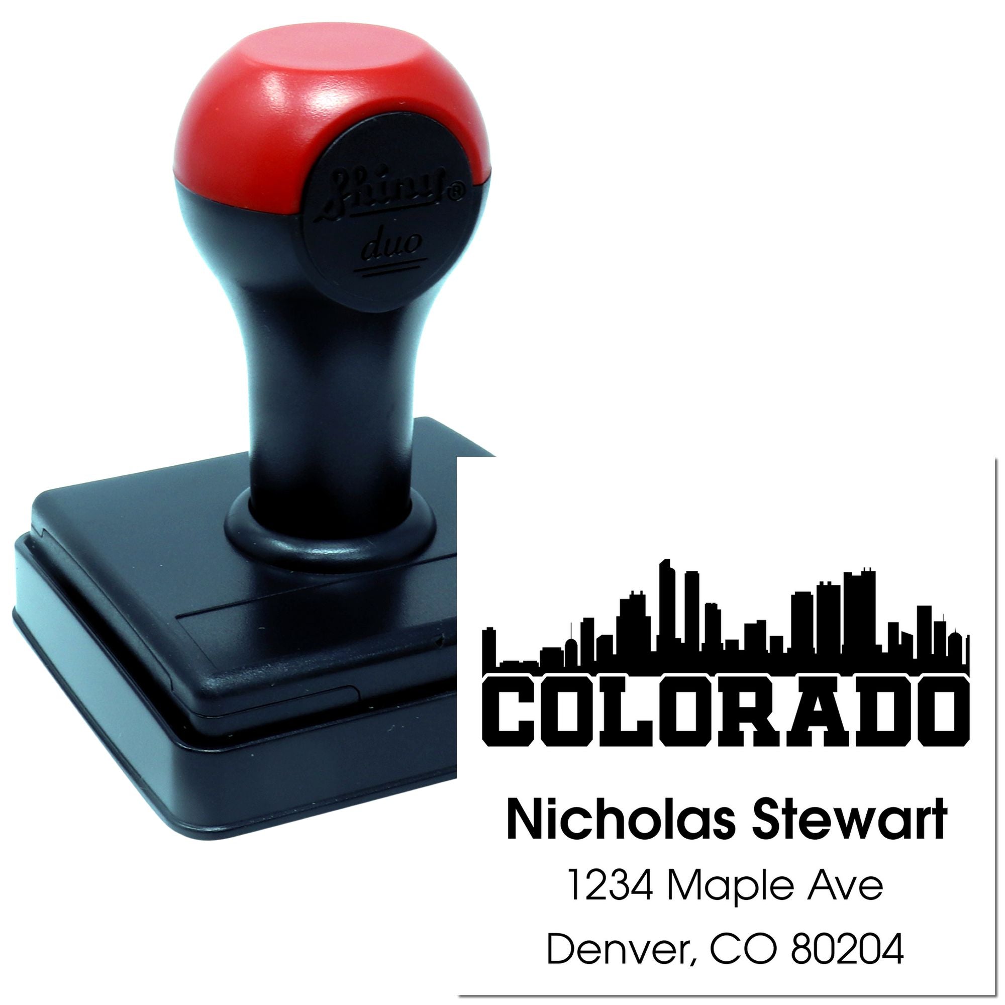 Custom Colorado address rubber stamp with skyline logo, name, and Denver, CO address for self-inking mailing use