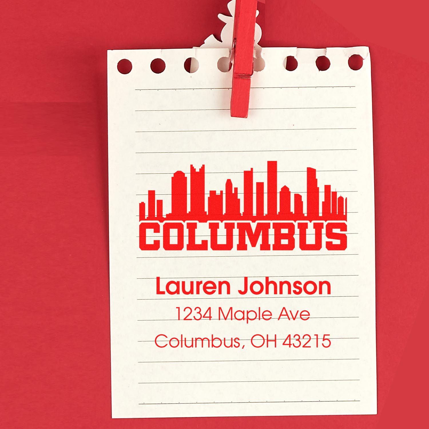 Custom Columbus return address rubber stamp with skyline design, Lauren Johnson name, and Ohio address on lined notepad.
