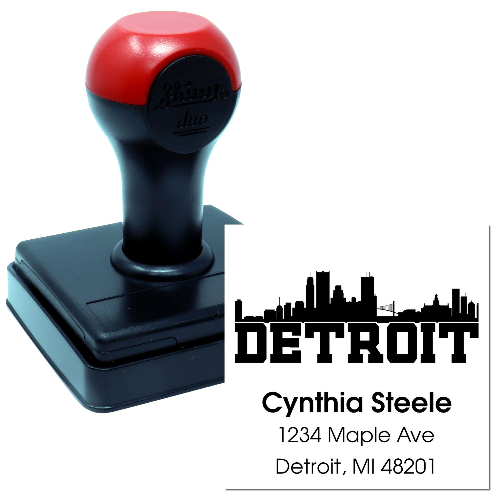 Self-inking Detroit return address rubber stamp with skyline, personalized for Cynthia Steele and 1234 Maple Ave.