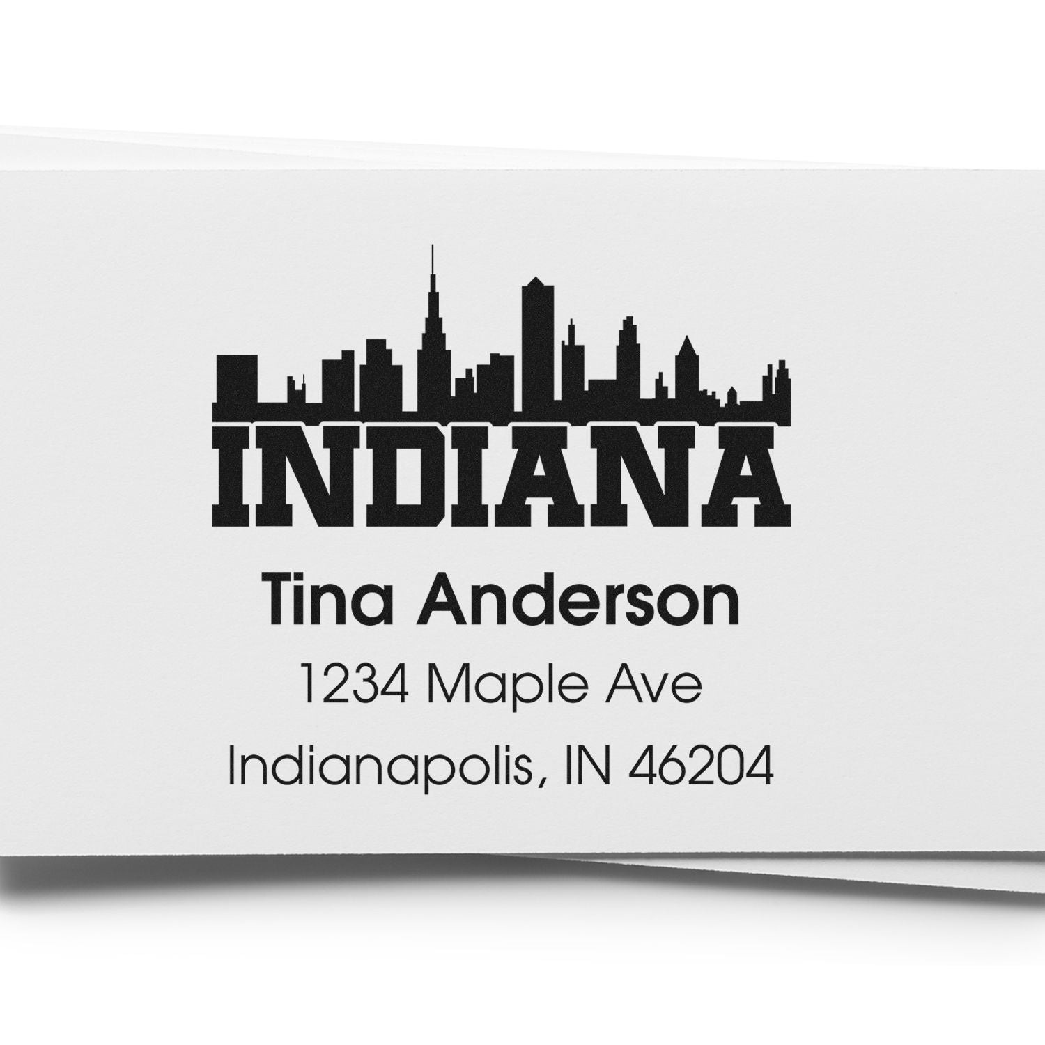Personalized rubber stamp with Indiana skyline return address for Tina Anderson, Indianapolis, IN 46204.