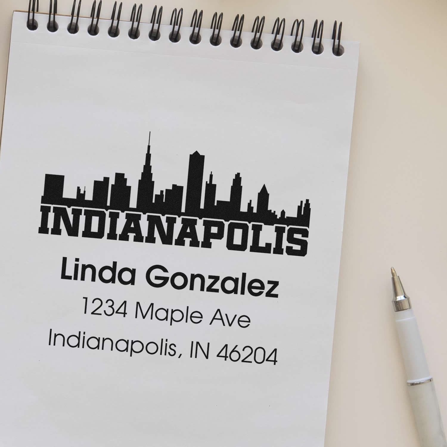 Custom Indianapolis return address rubber stamp with skyline logo, personalized name, and mailing address.