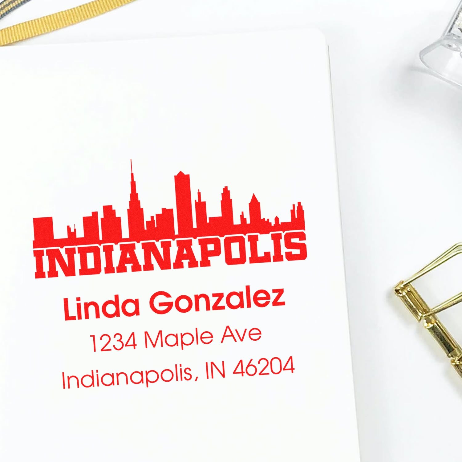 Custom rubber return address stamp with Indianapolis skyline, Linda Gonzalez, and mailing address for personalized correspondence.