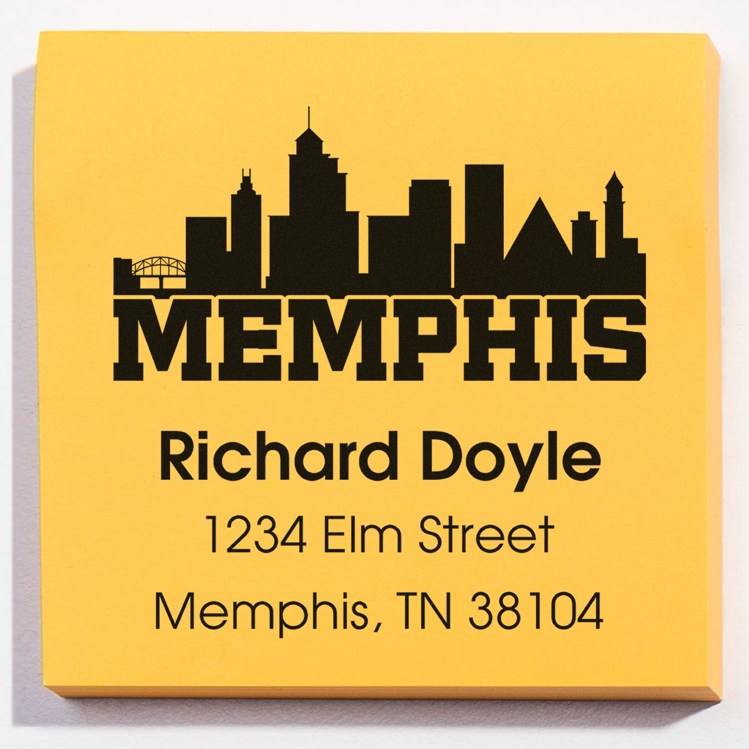 Custom Memphis skyline address rubber stamp with Richard Doyle, 1234 Elm Street, Memphis, TN 38104.