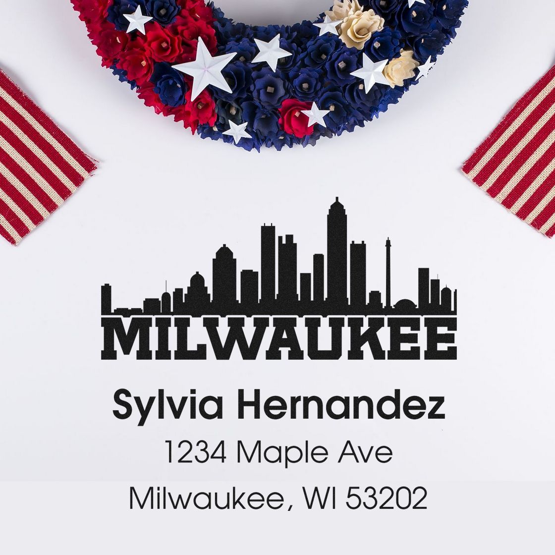 Custom Milwaukee address rubber stamp with skyline design, personalized name, and address for Sylvia Hernandez.