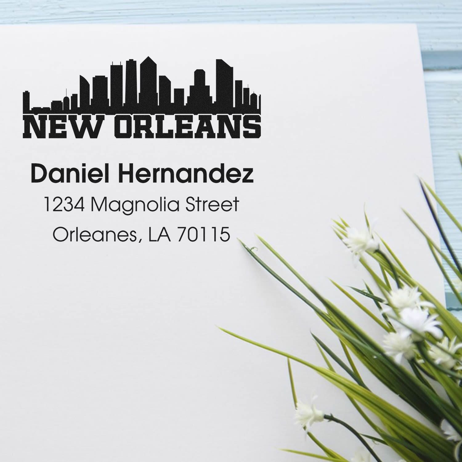 Custom New Orleans skyline return address stamp with Daniel Hernandez, 1234 Magnolia Street, Orleans, LA 70115.