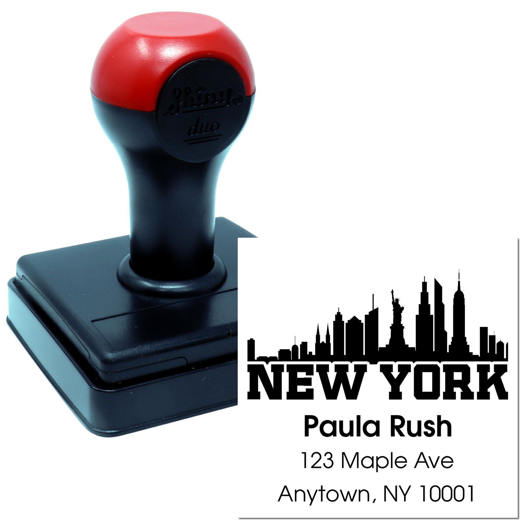 Custom self-inking rubber stamp with New York skyline and return address imprint for personalized business or mailing use.