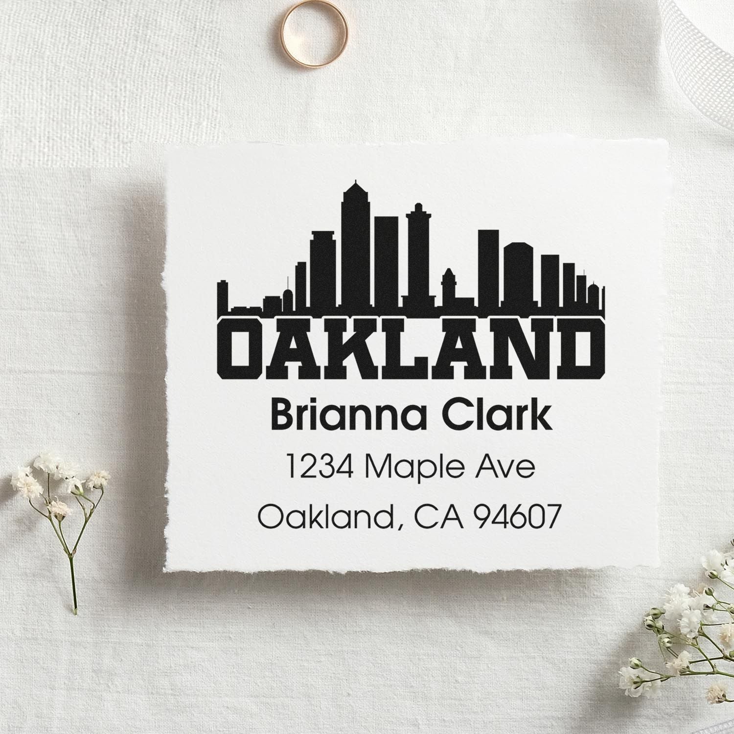Custom Oakland skyline address rubber stamp with Brianna Clark, 1234 Maple Ave, Oakland, CA 94607