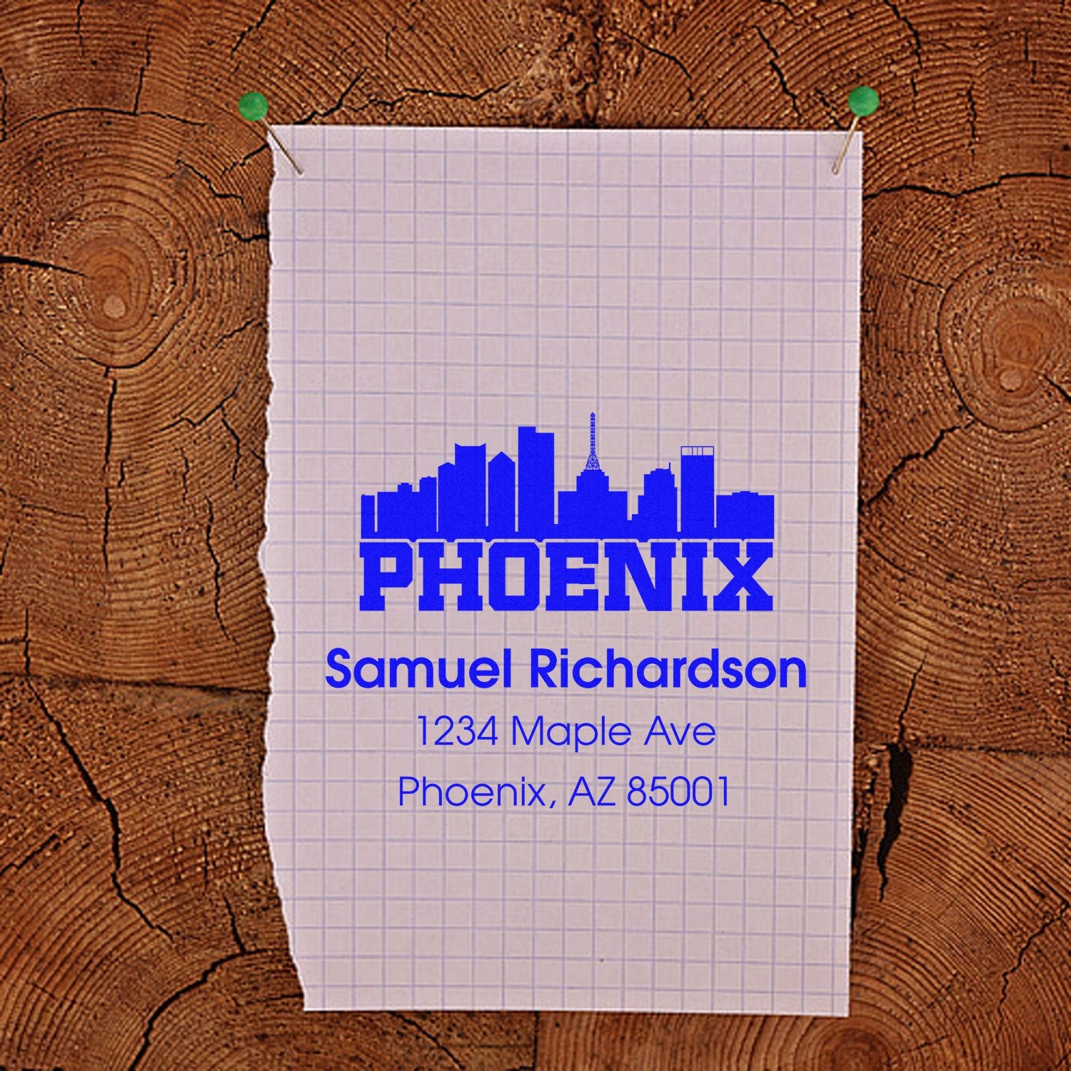 Custom Phoenix return address rubber stamp with skyline logo for Samuel Richardson, 1234 Maple Ave, Phoenix, AZ 85001.