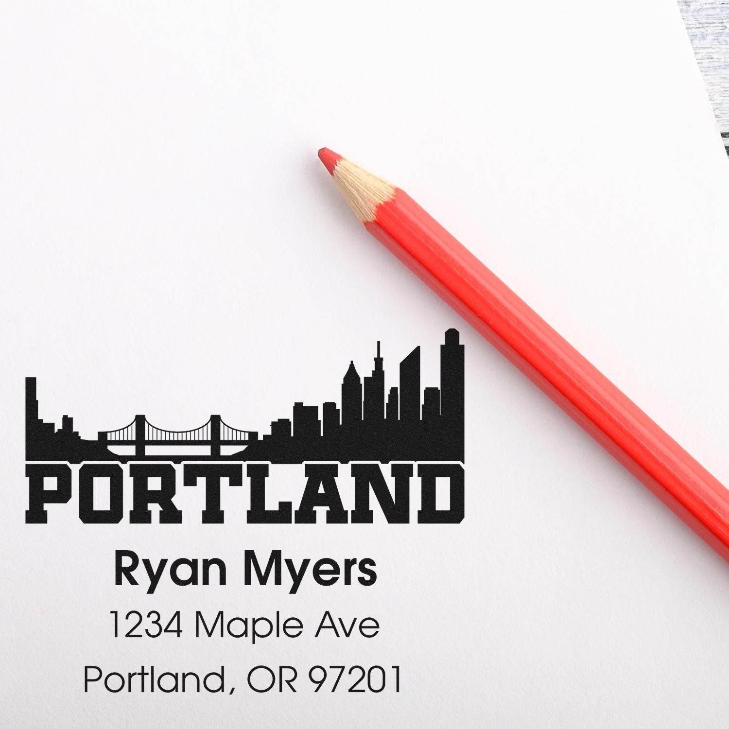 Custom return address rubber stamp with Portland skyline, featuring Ryan Myers name, street address, and ZIP code.