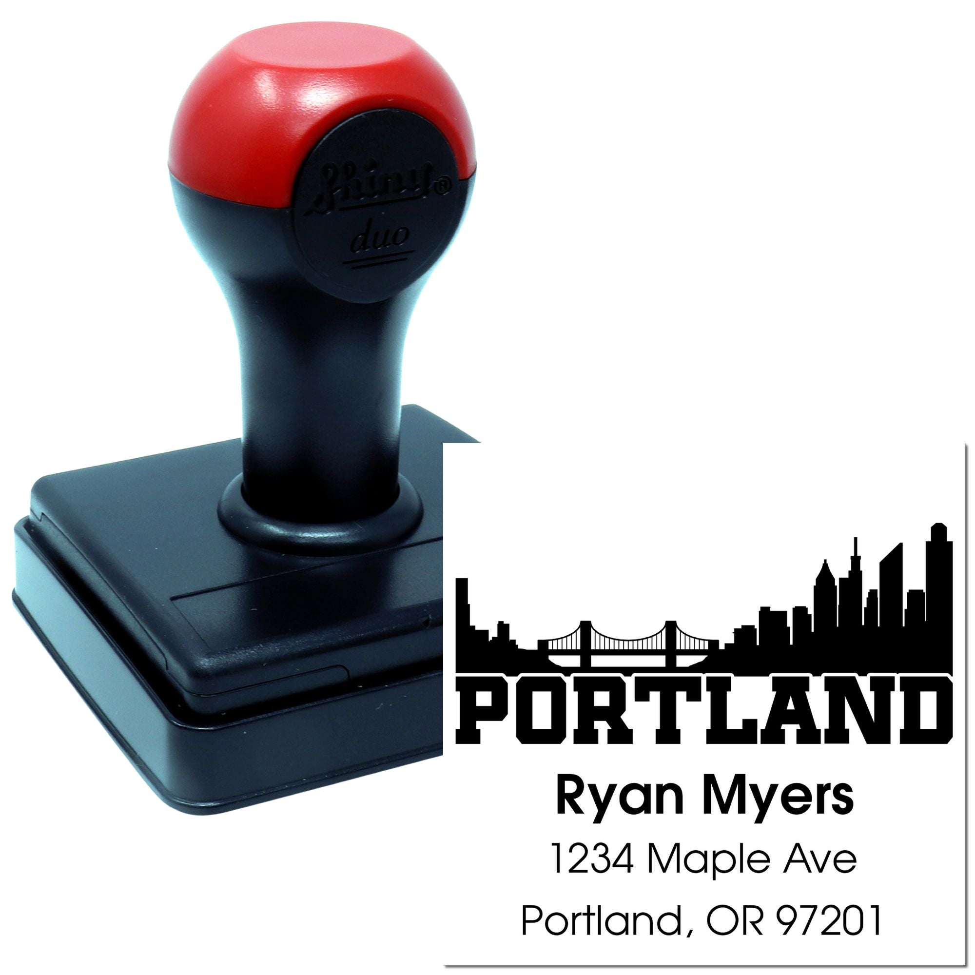 Custom self-inking address rubber stamp with Portland, OR skyline design for mailing and business correspondence.