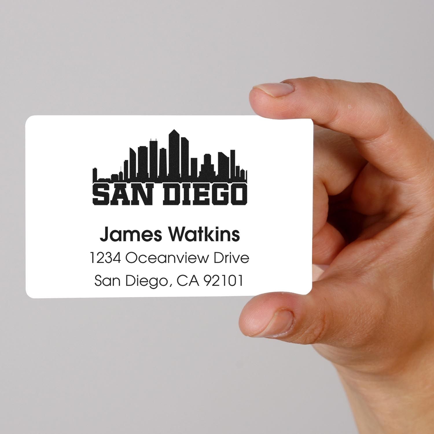 Custom San Diego address rubber stamp proof with skyline logo for business mailings.