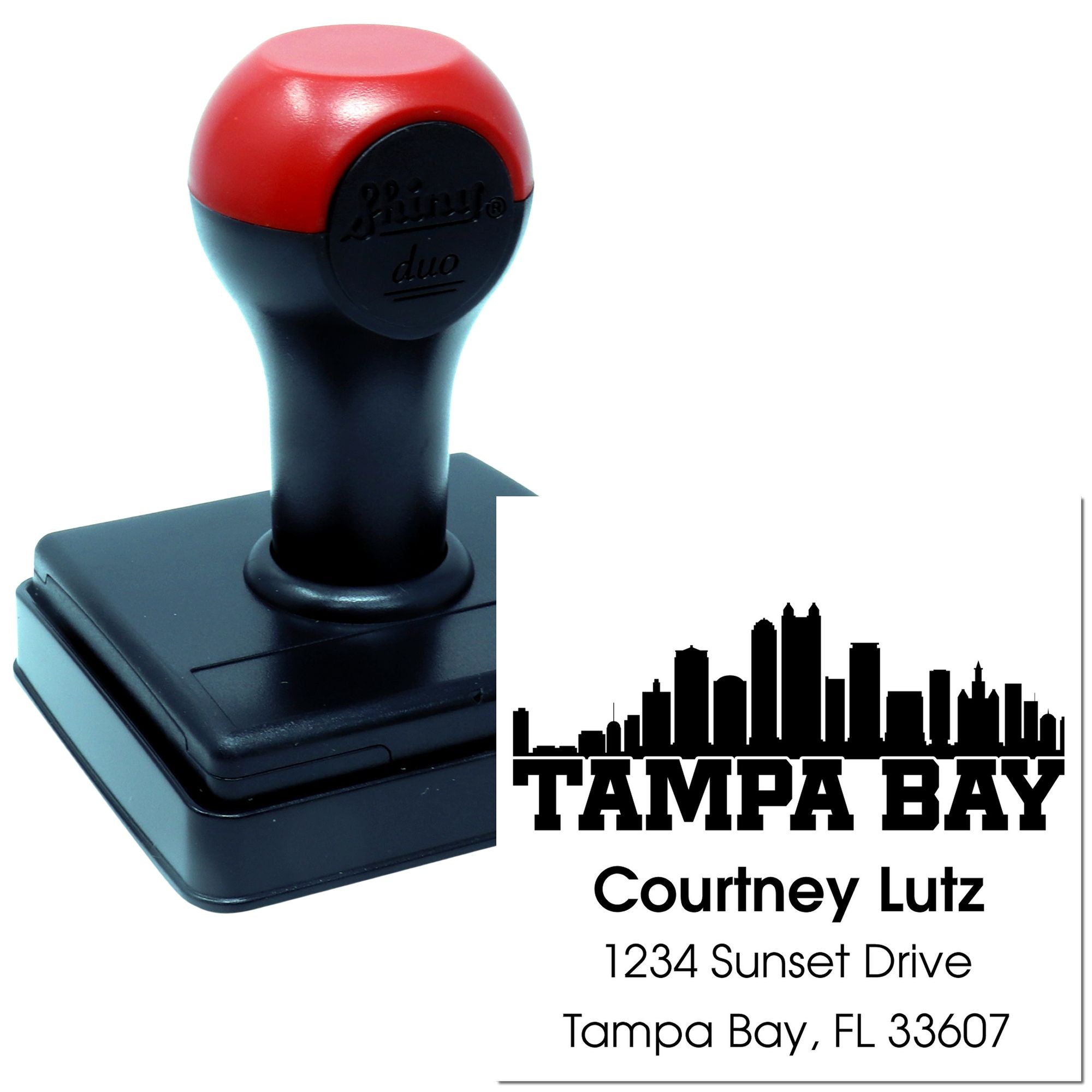 Custom Tampa Bay address rubber stamp with self-inking handle, skyline design, name, and mailing address.